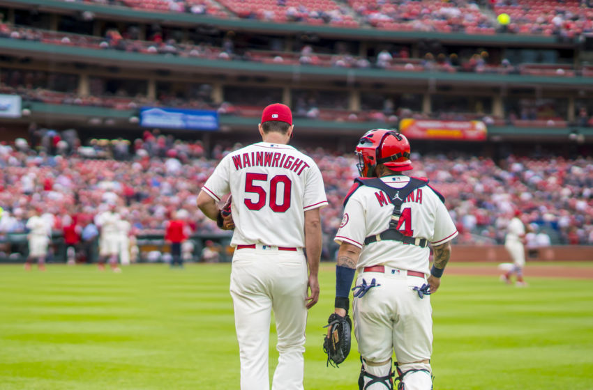 ST. LOUIS, MO - SEPTEMBER 22: Yadier Molina #4 and Adam Wainwright #50 of the St. Louis Cardinals walk from the bullpen to the home dugout prior to the start of the game against the San Francisco Giants on September 22, 2018 at Busch Stadium in St. Louis, Missouri. (Photo by Taka Yanagimoto/St. Louis Cardinals/Getty Images)