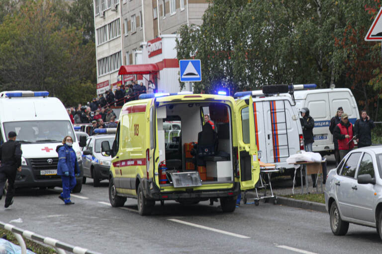 Police and paramedics work at the scene of a shooting at school No. 88 in Izhevsk, Russia, Monday, Sept. 26, 2022. A gunman on Monday morning killed 13 people and wounded 21 others in a school in central Russia, authorities said. Russias Investigative Committee said in statement that seven children were among those killed in the shooting in the school in Izhevsk, a city about 960 kilometers (596 miles) east of Moscow in the Udmurtia region. (AP Photo)